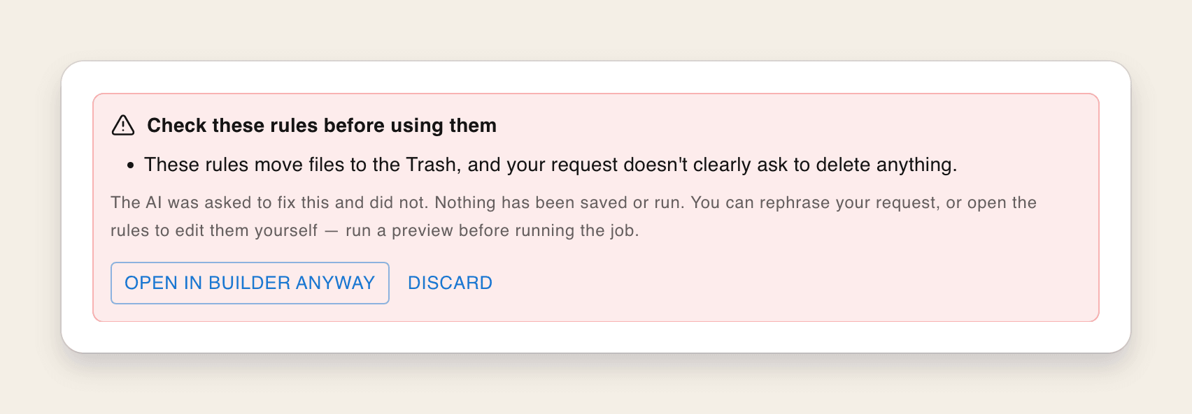 VaultSort holding back AI-built rules that move files to the Trash when the request didn't clearly ask to delete anything, with Open in builder anyway and Discard